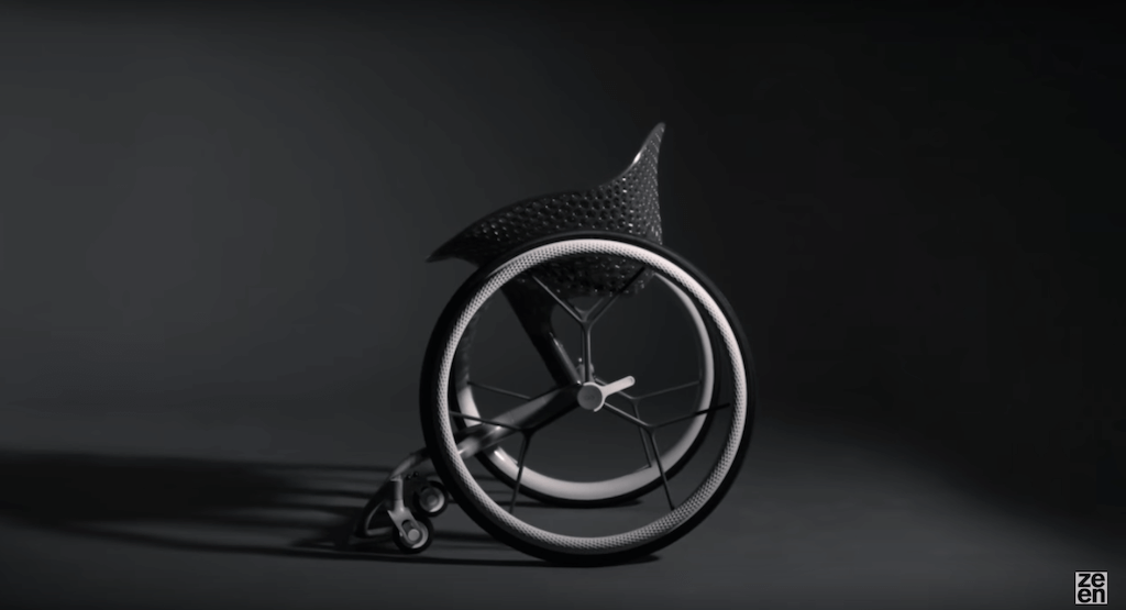 Для более удобного пользования коляской Layer были сделаны специальные перчатки ФОТО Скриншот видео Benjamin Hubert's Layer designs "world's first" 3D-printed consumer wheelchair Youtube-канал Dezeen
